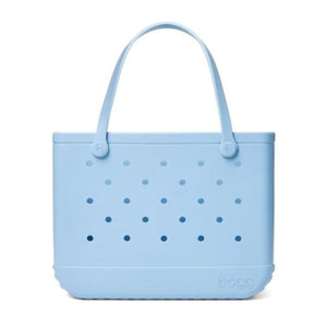 Light blue Bogg Bag tote with perforated holes and two handles
