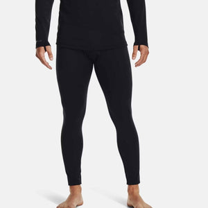 Under Armour black compression leggings worn with matching long sleeve top
