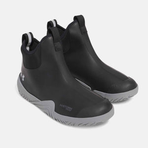 Under Armour black slip on boots with grey soles