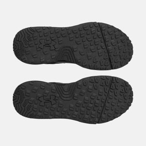 Under Armour black shoe outsoles with textured tread pattern