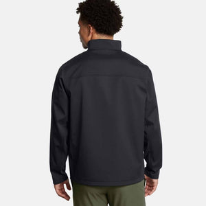 Back view of a person wearing a black Under Armour softshell jacket