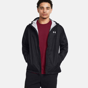 Man wearing black Under Armour hooded windbreaker jacket