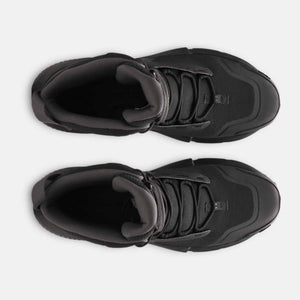 Top view of black Under Armour athletic sneakers