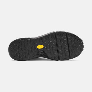 Under Armour shoe black treaded outsole with yellow Vibram logo