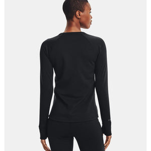 Back view of a person wearing a black Under Armour long sleeve shirt