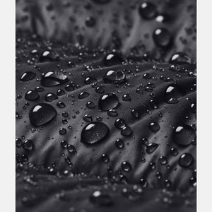 Water droplets on black Under Armour water resistant fabric