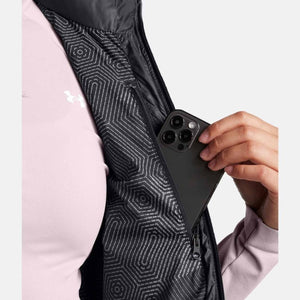 Under Armour vest interior pocket holding a smartphone