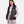 Woman wearing a black Under Armour puffer vest over a light purple long sleeve top and matching pants