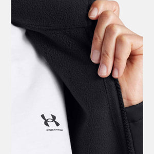 Close up of black Under Armour fleece jacket zipper and logo