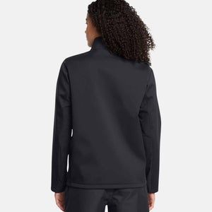 Back view of a person wearing a black softshell jacket with a high collar