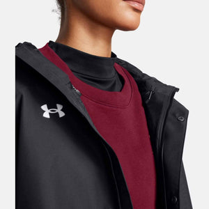 Under Armour black hooded jacket with logo over a maroon sweatshirt