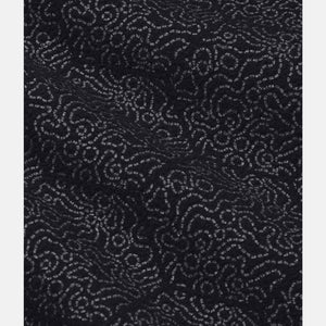Under Armour black fabric with a grey swirling abstract pattern