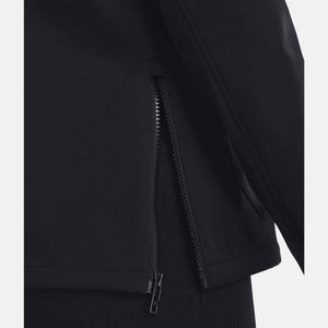 Close up of the side zipper detail on a black Under Armour jacket