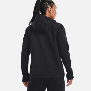 Back view of a person wearing a black Under Armour hooded jacket
