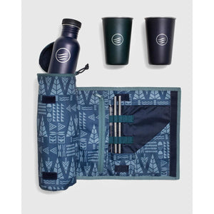 United by Blue travel kit with metal water bottle, two cups, and stainless steel straws in a patterned roll up case