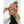 FNDN beanie with orange and grey grid pattern and pom pom