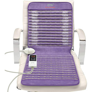 UTK Technology purple infrared heating pad with digital controller on an office chair