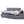 Person lying on a UTK Technology infrared heating mat on a grey sofa
