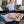 Man using a UTK Technology heating pad while lying on a sofa