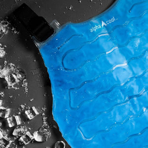AlphaCool blue gel ice pack with black strap on dark surface with ice cubes