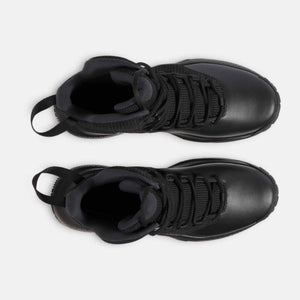Top view of Under Armour black athletic boots with laces