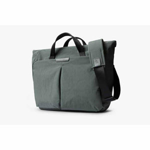 Bellroy grey messenger bag with black handles and shoulder strap