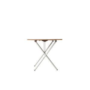 Side view of a folding table with a wooden top and silver metal cross legs