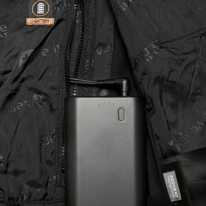 Venture Heat battery pack connected to a jacket interior pocket