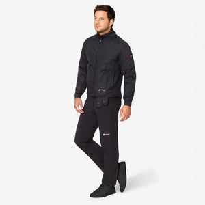 Man wearing black Venture Heat jacket and matching trousers