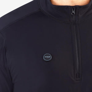 Close up of black Venture Heat quarter zip shirt with chest power button
