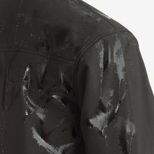 Close up of Venture Heat black jacket fabric with water droplets on the surface