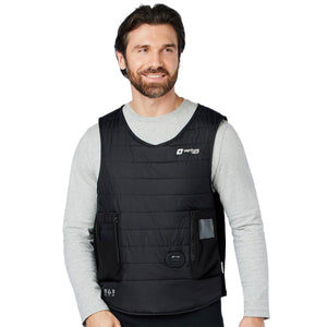 Man wearing a black Venture Heat heated vest over a grey long sleeve shirt