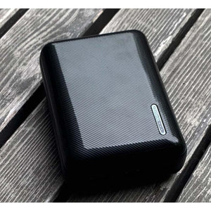 Volt Heat 10000mAh portable power bank on a wooden surface