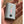 Volt Heat 7V rechargeable battery pack held in palm