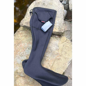 Volt Heat black heated sock with battery pack in pocket on stone surface