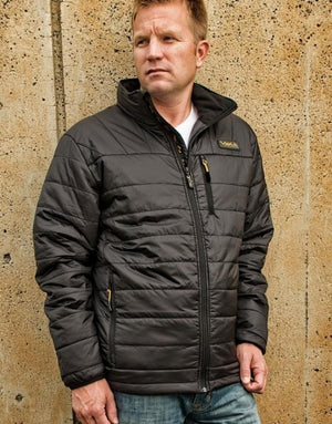 Man wearing a black Volt Heat quilted jacket with a front zipper and chest pocket