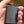 Volt Heat rechargeable battery pack with power indicator lights held in hand