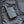 Volt Heat 6000mAh battery pack plugged into a black jacket pocket