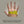 Hand being measured with a yellow tape measure to determine glove size