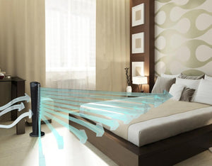 Vornado tower fan in a bedroom with graphic arrows illustrating airflow