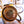 Vornado yellow and black utility air circulator fan on a wooden floor