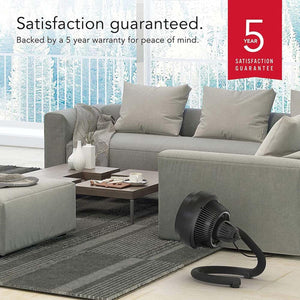 Vornado air circulator in a living room with a 5 year satisfaction guarantee graphic