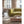 Vornado white air purifier on a wooden floor in a living room