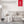 Vornado fan in living room with 5 year satisfaction guarantee graphic