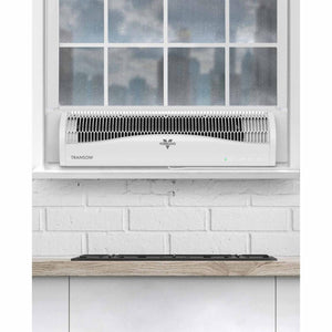 Vornado Transom window fan installed on a white windowsill