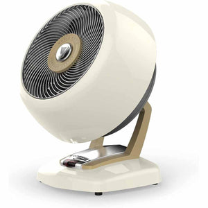 Vornado cream colored spherical space heater with a gold stand