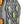 Winter Walking ice cleat tread with metal studs and yellow circular accents