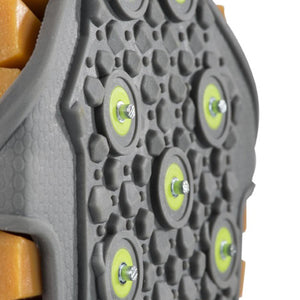 Winter Walking ice cleat tread with metal studs and yellow circular accents