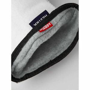Interior of a Hestra glove showing grey fleece lining and G-Loft label