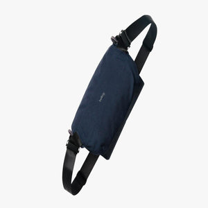 Bellroy navy blue sling bag with adjustable black strap